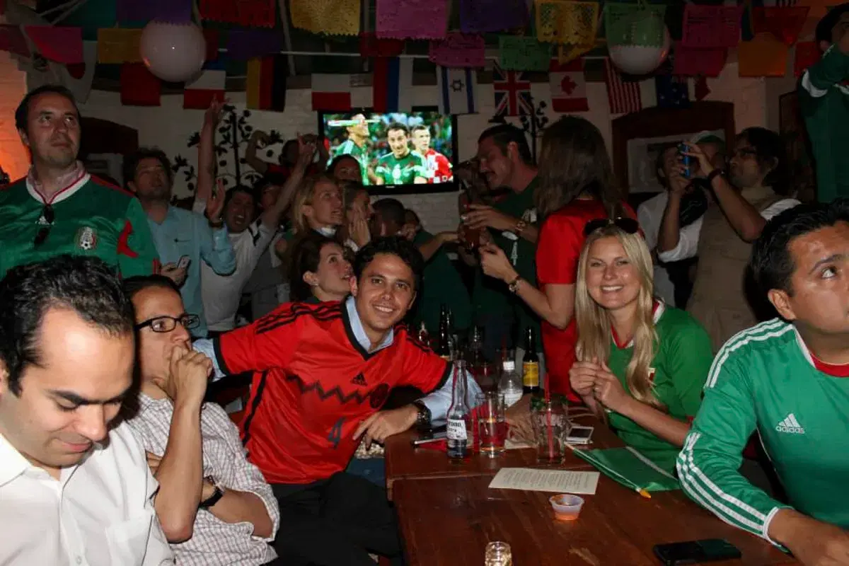 People watching soccer at Papatzul