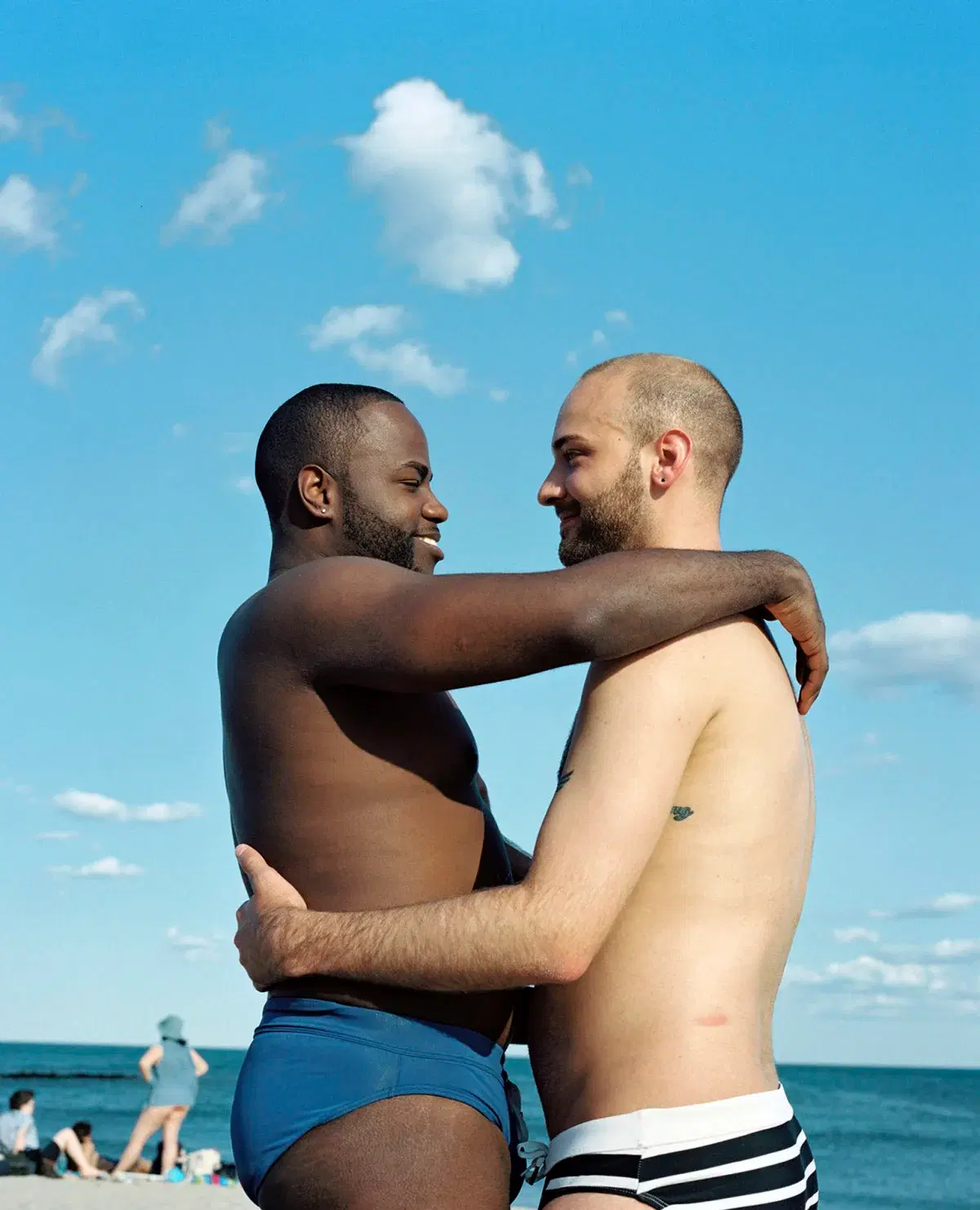 People hugging at Jacob Riis Park Beach