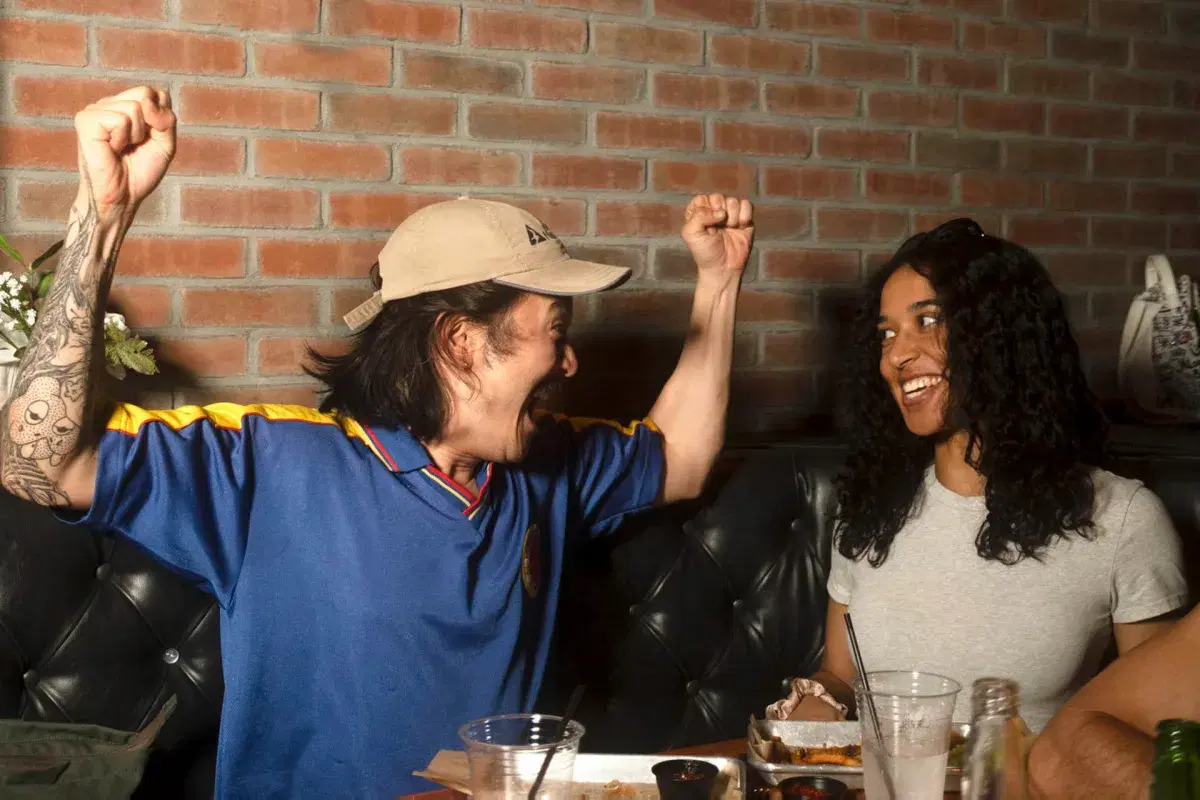 Two people celebrate while watching Colombia’s game against Costa Rica at Bar 43 in Queens. 