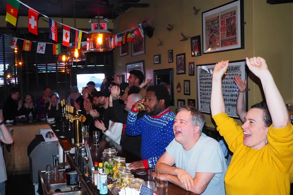 People watching soccer at The Monro Pub