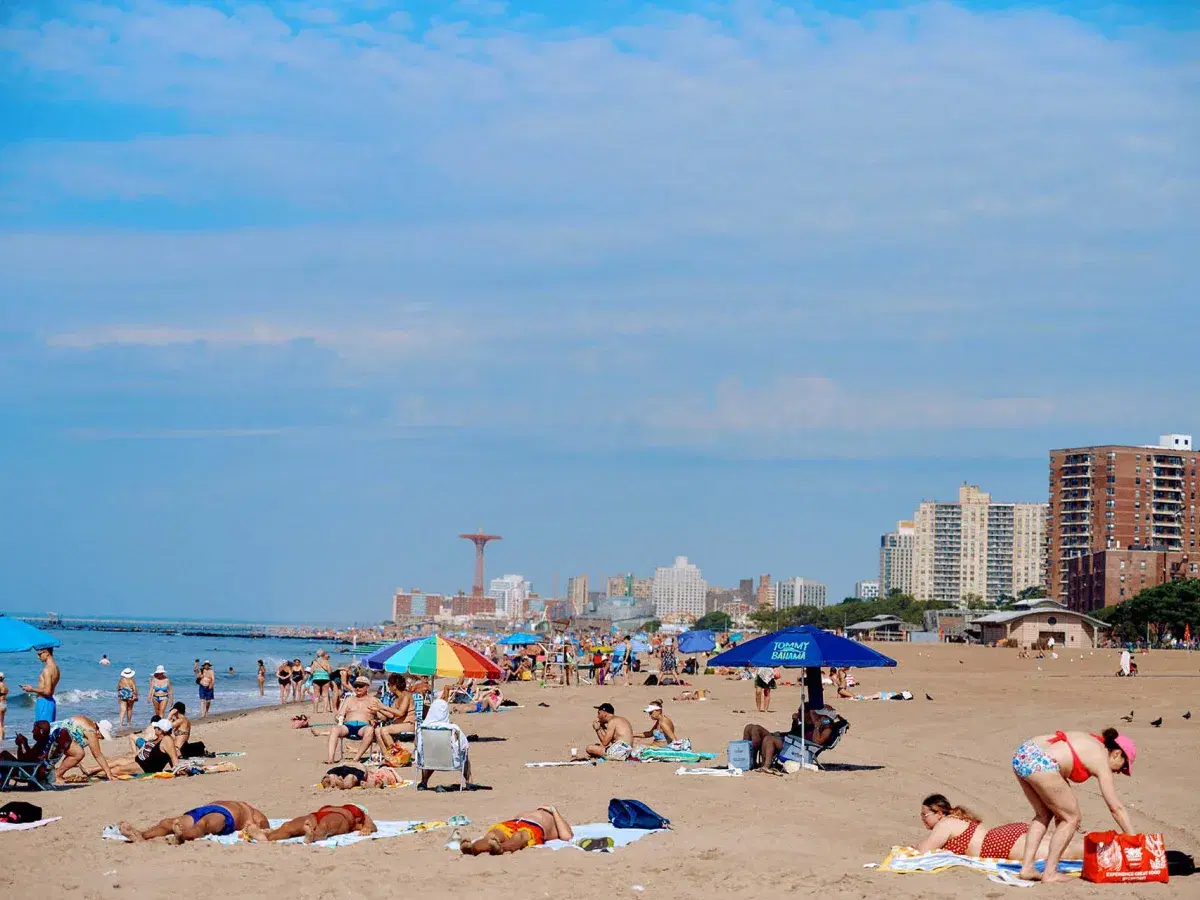 People spend the day at Brighton Beach in Brooklyn. 