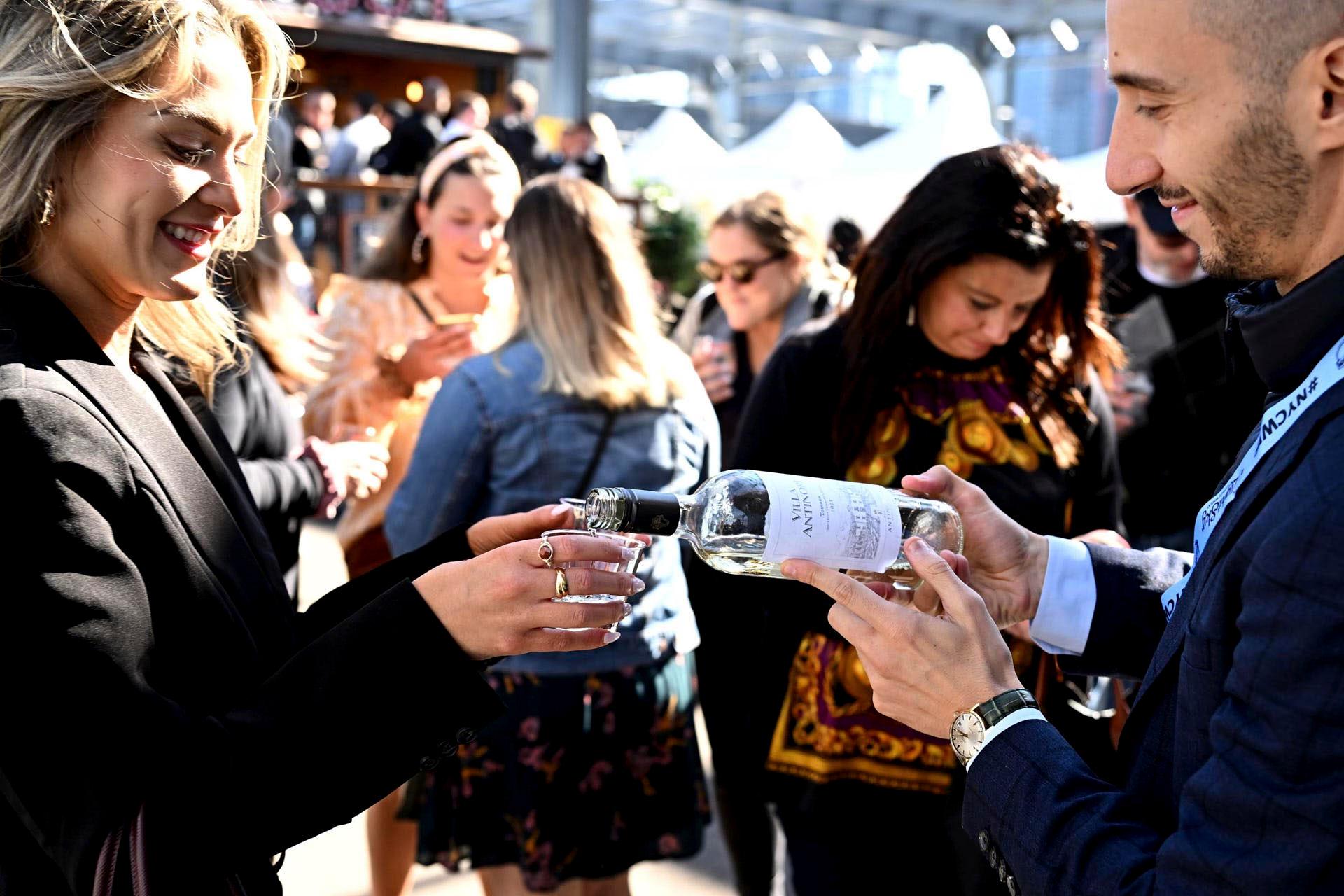 People drinking wine at NYCWFF