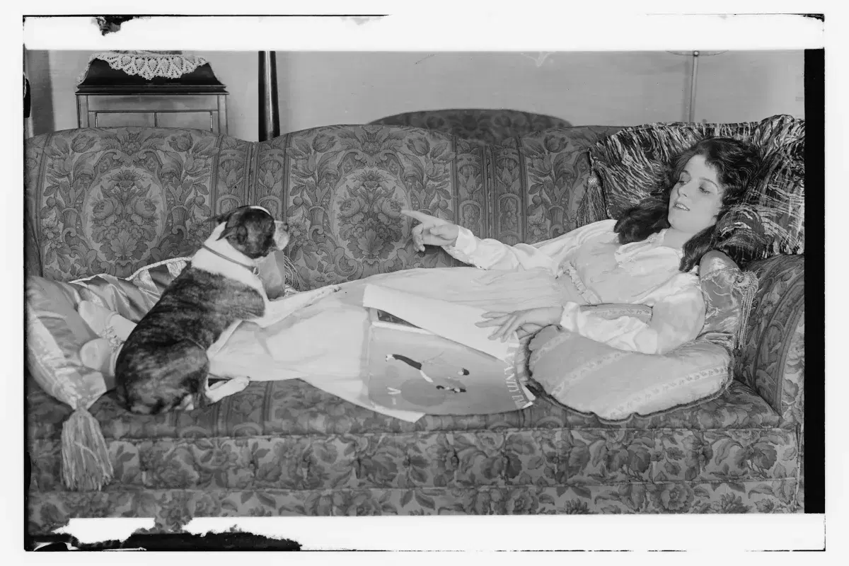 Archival image of Olive Thomas on couch