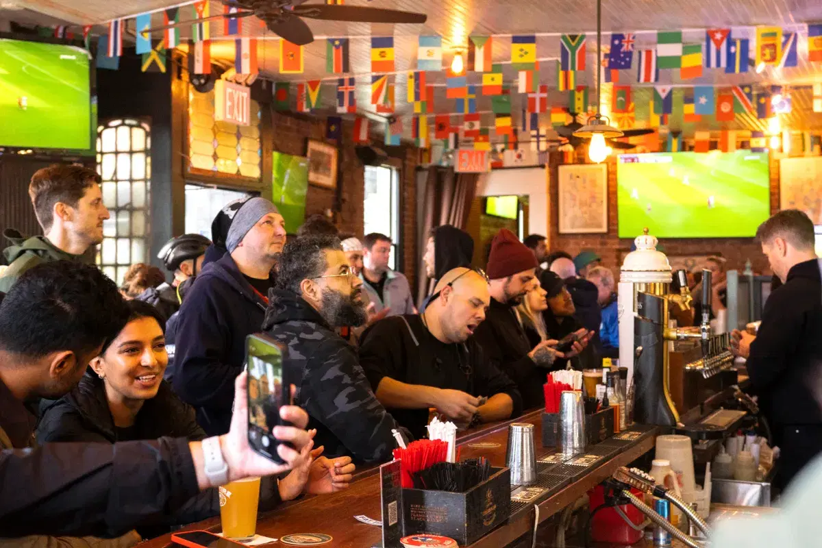 People watching soccer at Kent Ale House