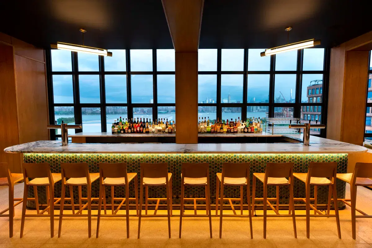 Bar with view of Manhattan in the background