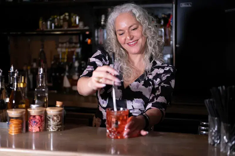 Lynnette Marrero making a cocktail